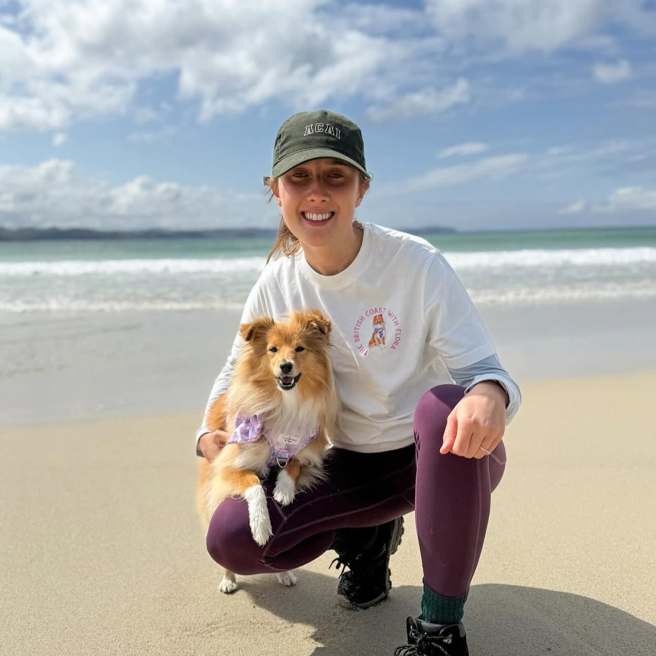 Person with a dog on a beach