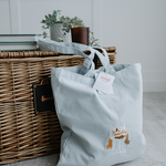 a custom embroidered tote bag featuring a hand-drawn pet portrait, the perfect personalised pet gift