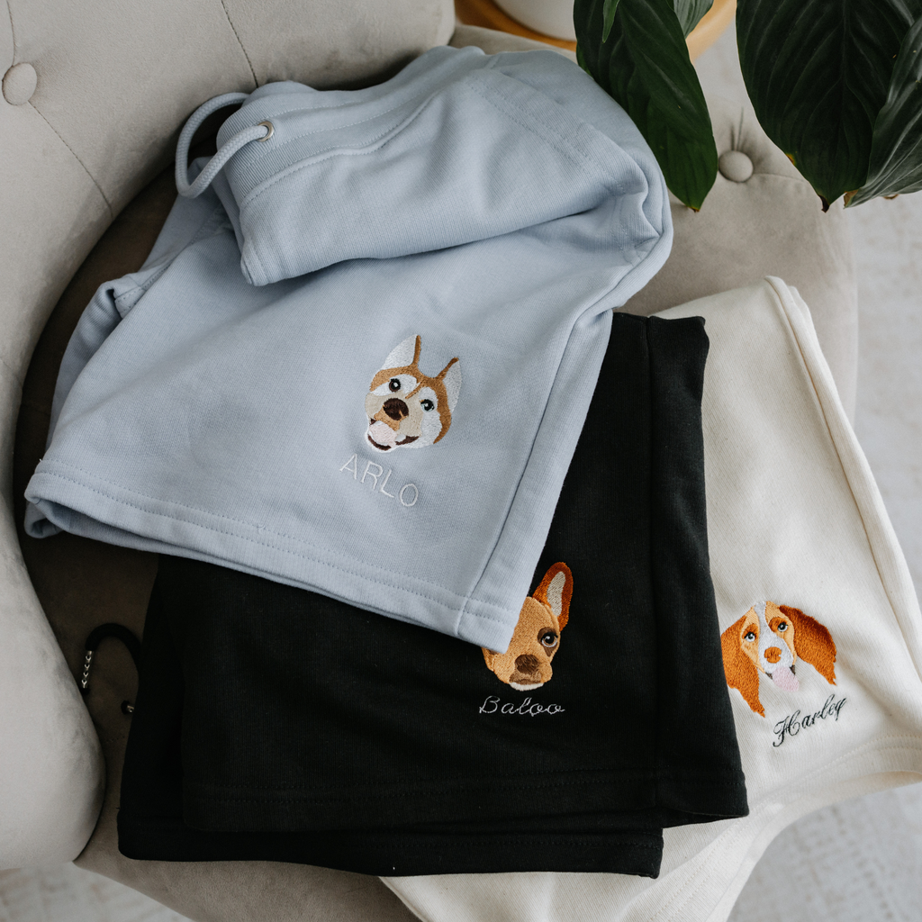 a custom embroidered sweatshirt and short set featuring a hand-drawn pet portrait, the perfect personalised pet gift for a dog mum