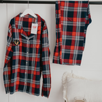 a custom embroidered pyjama set featuring a hand-drawn pet portrait, the perfect personalised pet gift