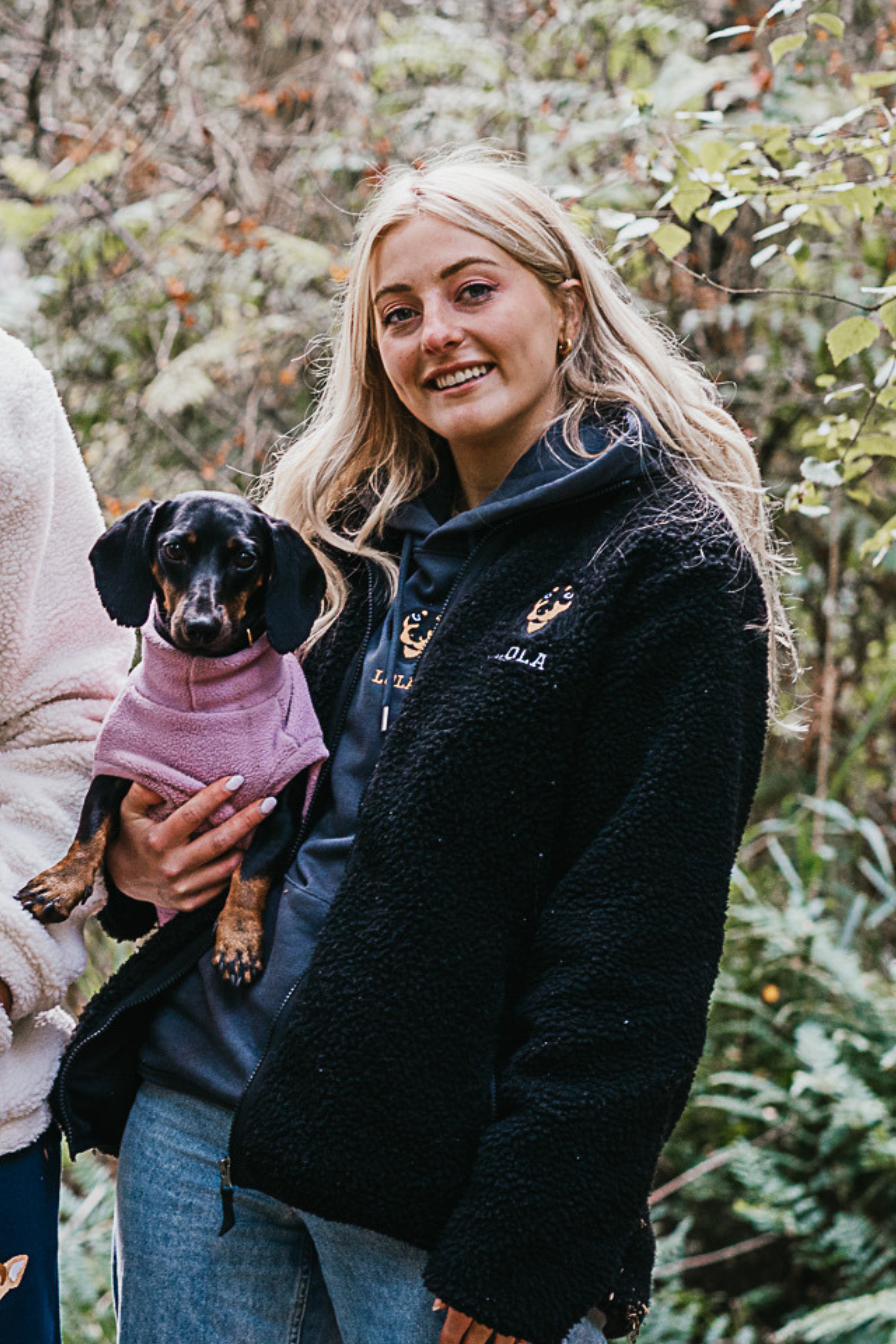 a custom embroidered dog walker sherpa jacket featuring a hand-drawn pet portrait, the perfect personalised pet gift for a dog mum
