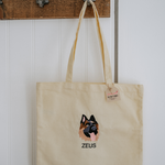 a custom embroidered tote bag featuring a hand-drawn pet portrait, the perfect personalised pet gift