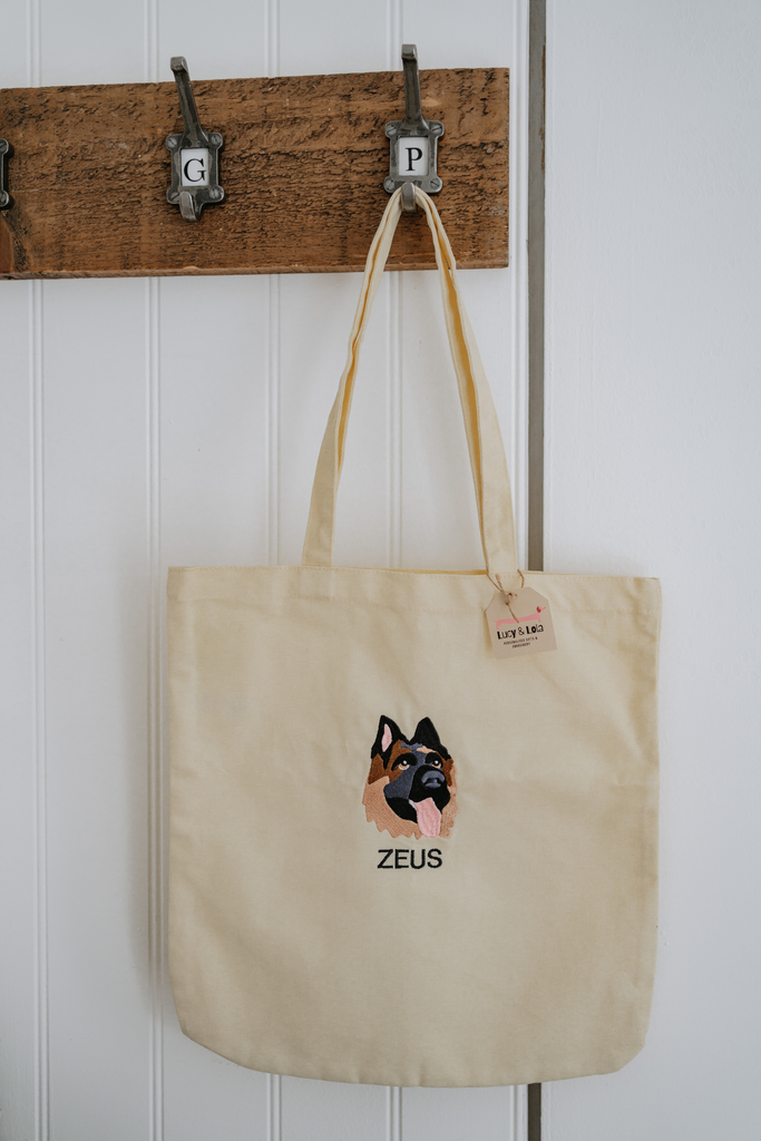 a custom embroidered tote bag featuring a hand-drawn pet portrait, the perfect personalised pet gift