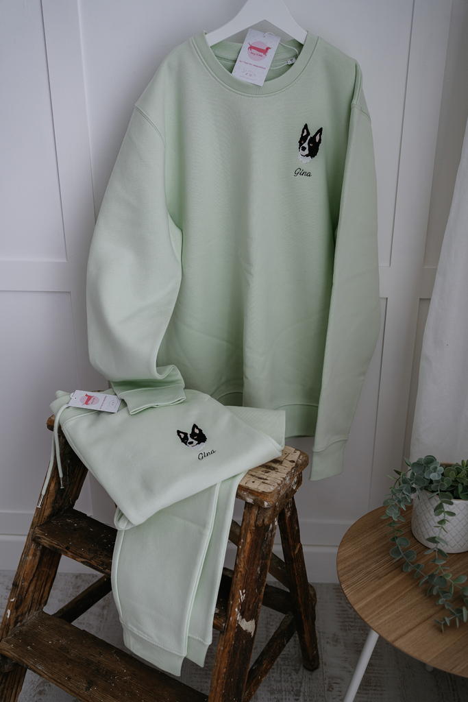 a custom embroidered  sweatshirt and tracksuit set featuring a hand-drawn pet portrait, the perfect personalised pet gift