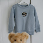 a custom embroidered hoodie featuring a hand-drawn pet portrait, the perfect personalised pet gift.