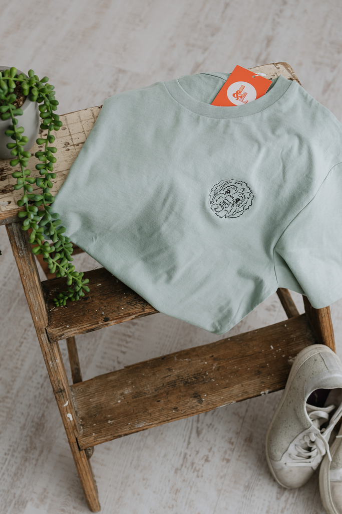 a custom embroidered t shirt featuring a hand-drawn pet portrait, the perfect personalised pet gift 