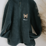 a custom embroidered dog walker sherpa jacket featuring a hand-drawn pet portrait, the perfect personalised pet gift for a dog mum