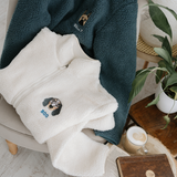a custom embroidered dog walker sherpa jacket featuring a hand-drawn pet portrait, the perfect personalised pet gift for a dog mum