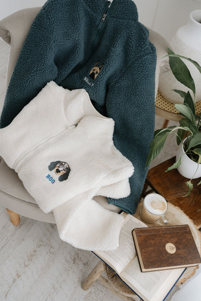 a custom embroidered dog walker sherpa jacket featuring a hand-drawn pet portrait, the perfect personalised pet gift for a dog mum