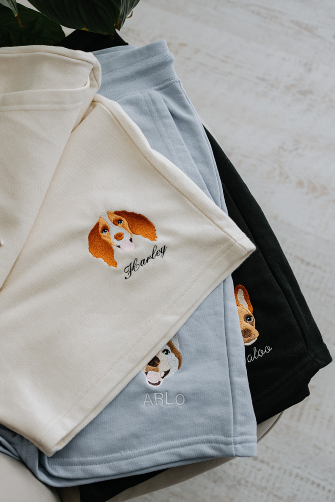 a custom embroidered sweatshirt and short set featuring a hand-drawn pet portrait, the perfect personalised pet gift for a dog mum