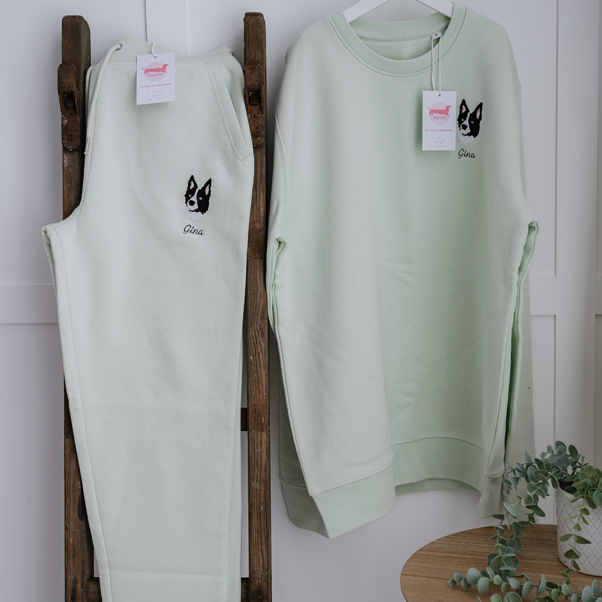 a custom embroidered organic cotton tracksuit bottoms featuring a hand-drawn pet portrait, the perfect personalised pet gift for a dog mum